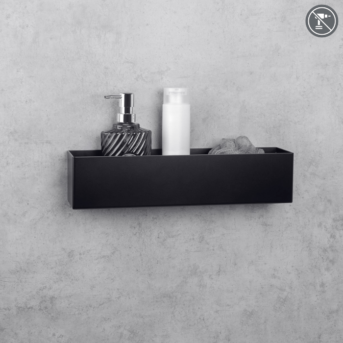 a sleek black wall-mounted shelf holding a pump soap dispenser, a white bottle, and a gray sponge against a textured gray wall.